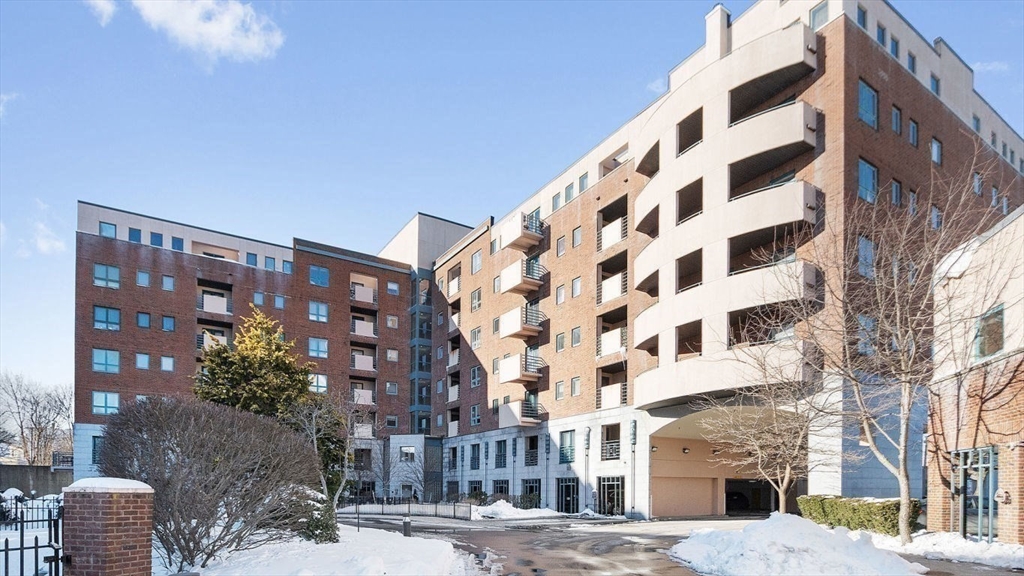 165 Cottage Street, Unit 410 Chelsea, MA 02150 - Photo 22 of 25 a view of a building with a street