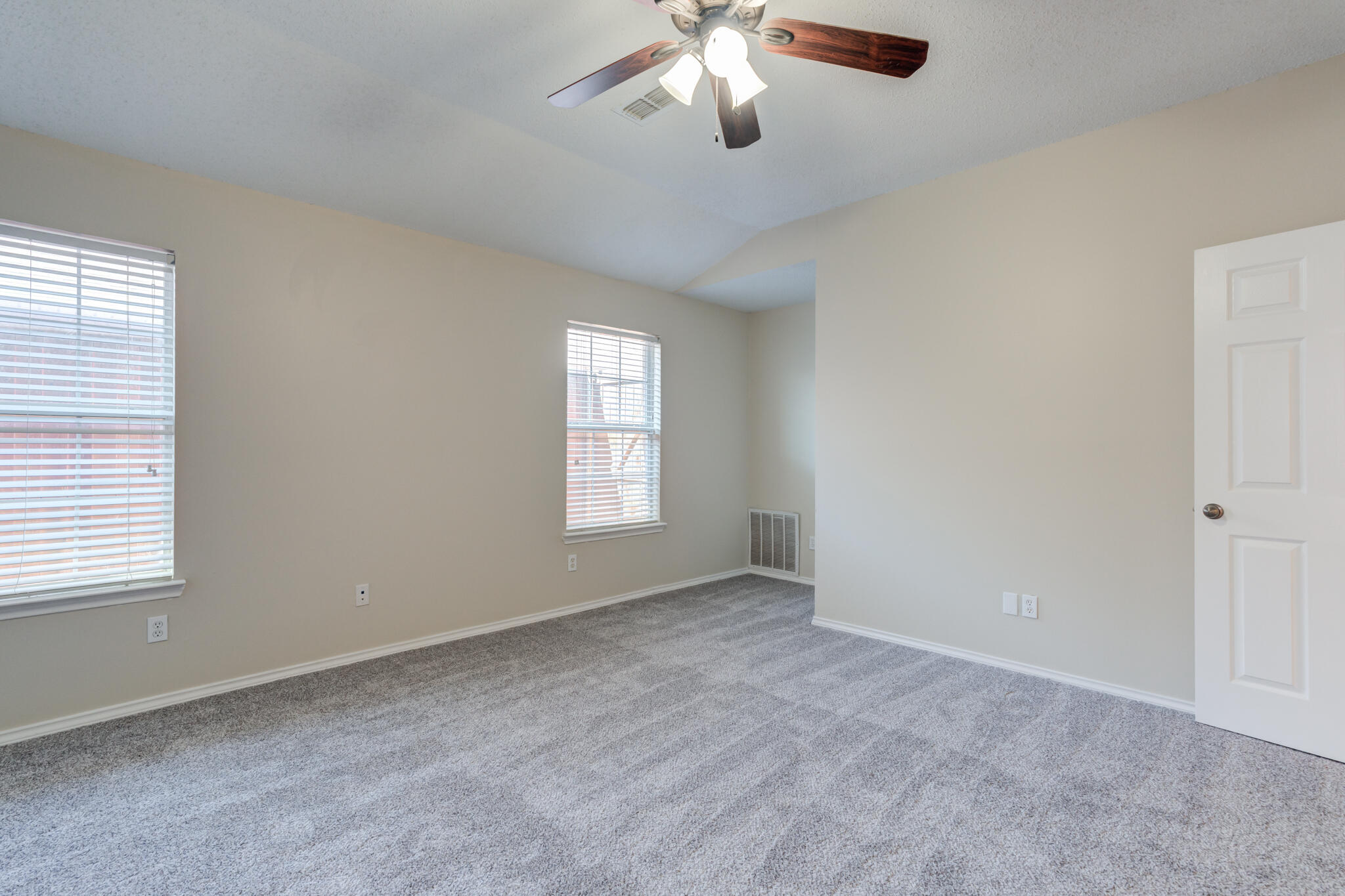6713 85th Street Lubbock, TX 79424 - Photo 9 of 16 a view of an empty room with a window