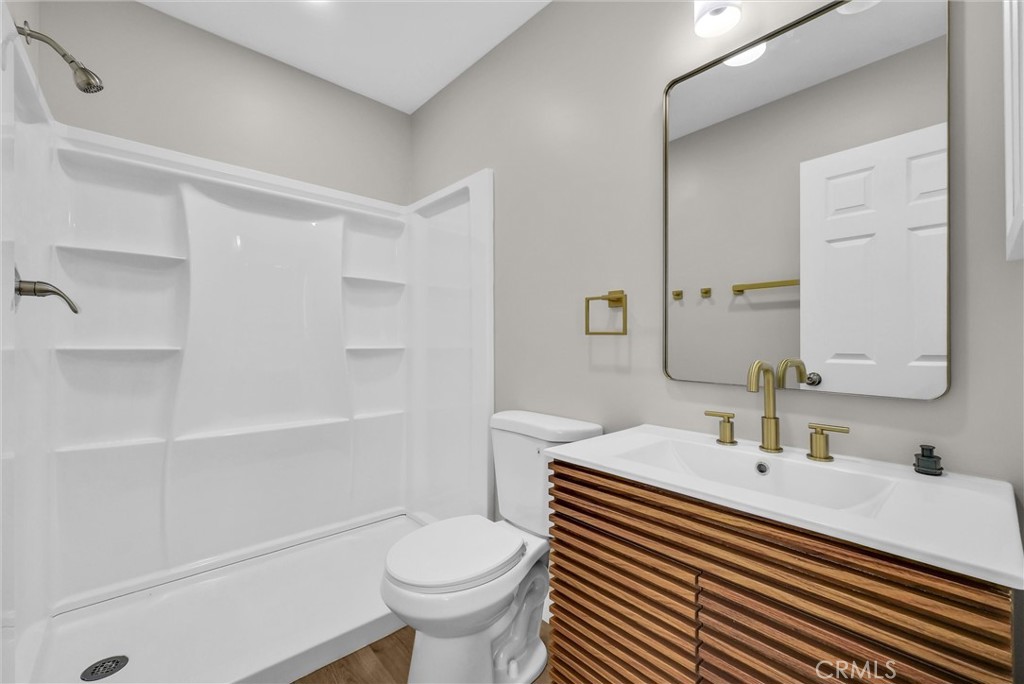 2264 Cogswell Road El Monte, CA 91732 - Photo 17 of 26 a bathroom with a sink a toilet and shower