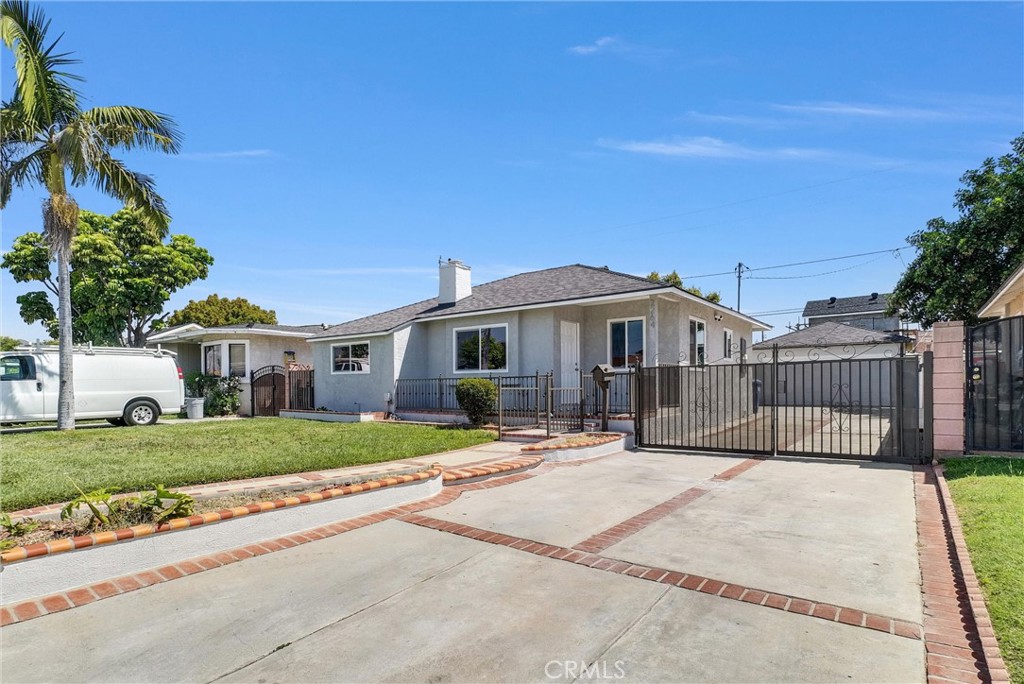 2264 Cogswell Road El Monte, CA 91732 - Photo 2 of 26 a front view of a house with a patio