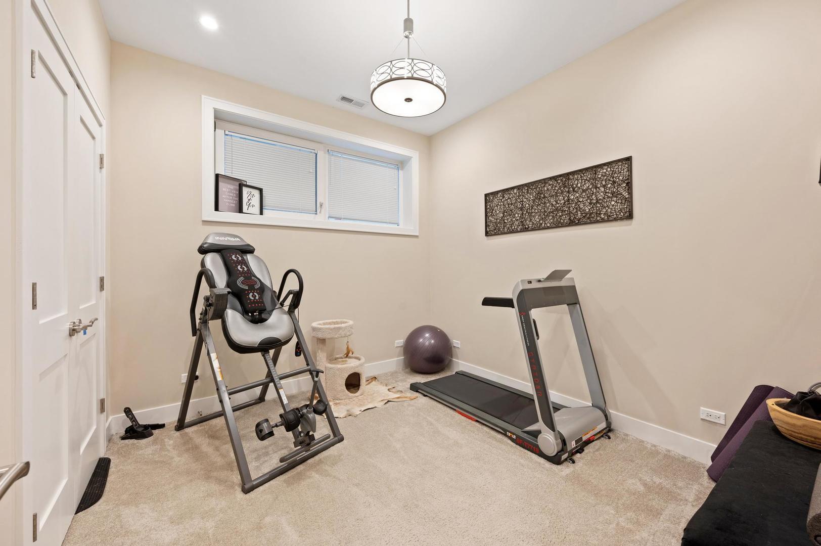 832 West Cullerton Street, Unit 1W Chicago, IL 60608 - Photo 12 of 14 a view of a room with gym equipment