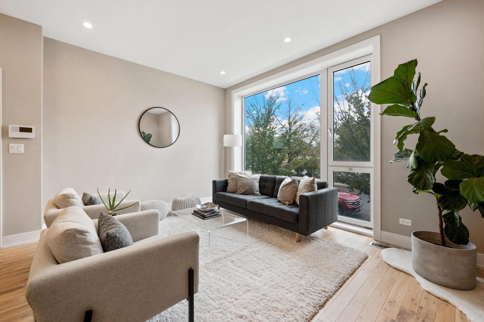 832 West Cullerton Street, Unit 1W Chicago, IL 60608 - Photo 4 of 14 a living room with furniture flowerpot and window