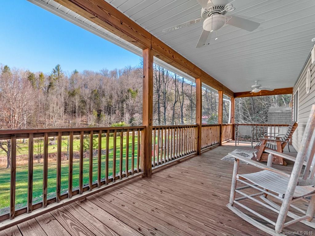 114 Turkey Creek Road Clyde, NC 28721 - Photo 3 of 12 a view of a two chairs in the balcony