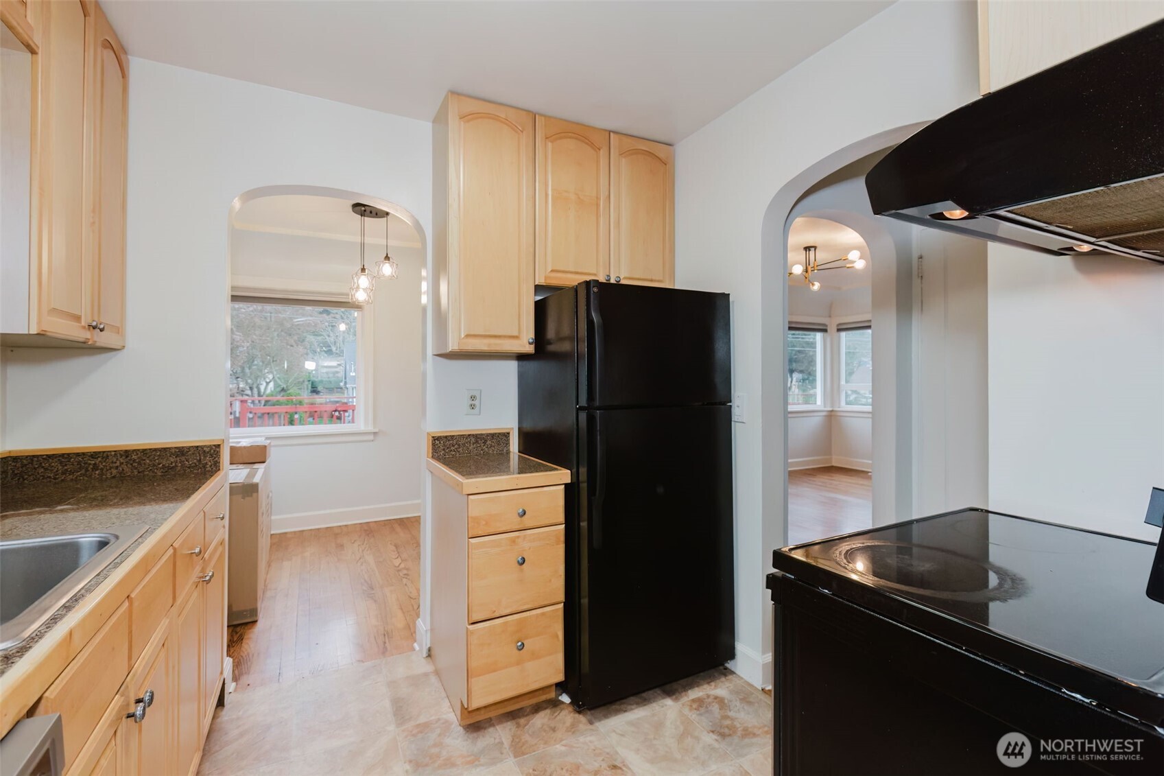1908 Snyder Avenue Bremerton, WA 98312 - Photo 19 of 35 a kitchen with a refrigerator and a stove