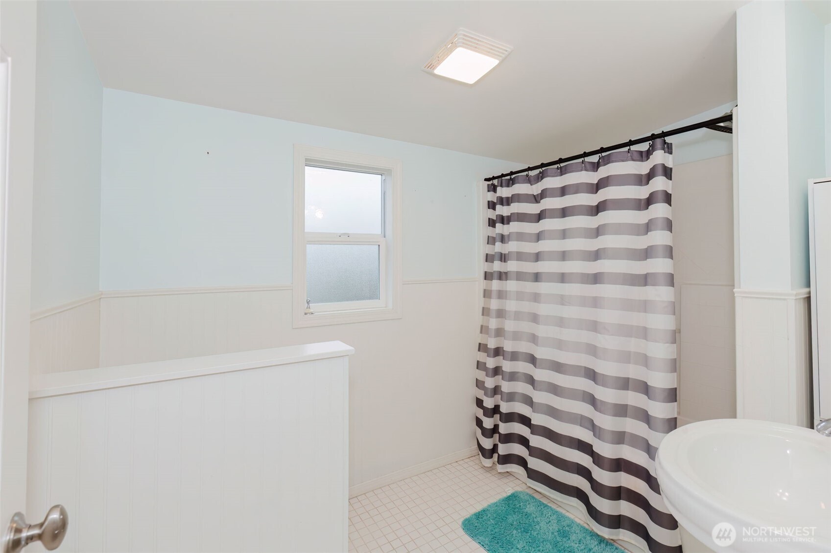 1908 Snyder Avenue Bremerton, WA 98312 - Photo 25 of 35 a bathroom with a sink toilet and shower