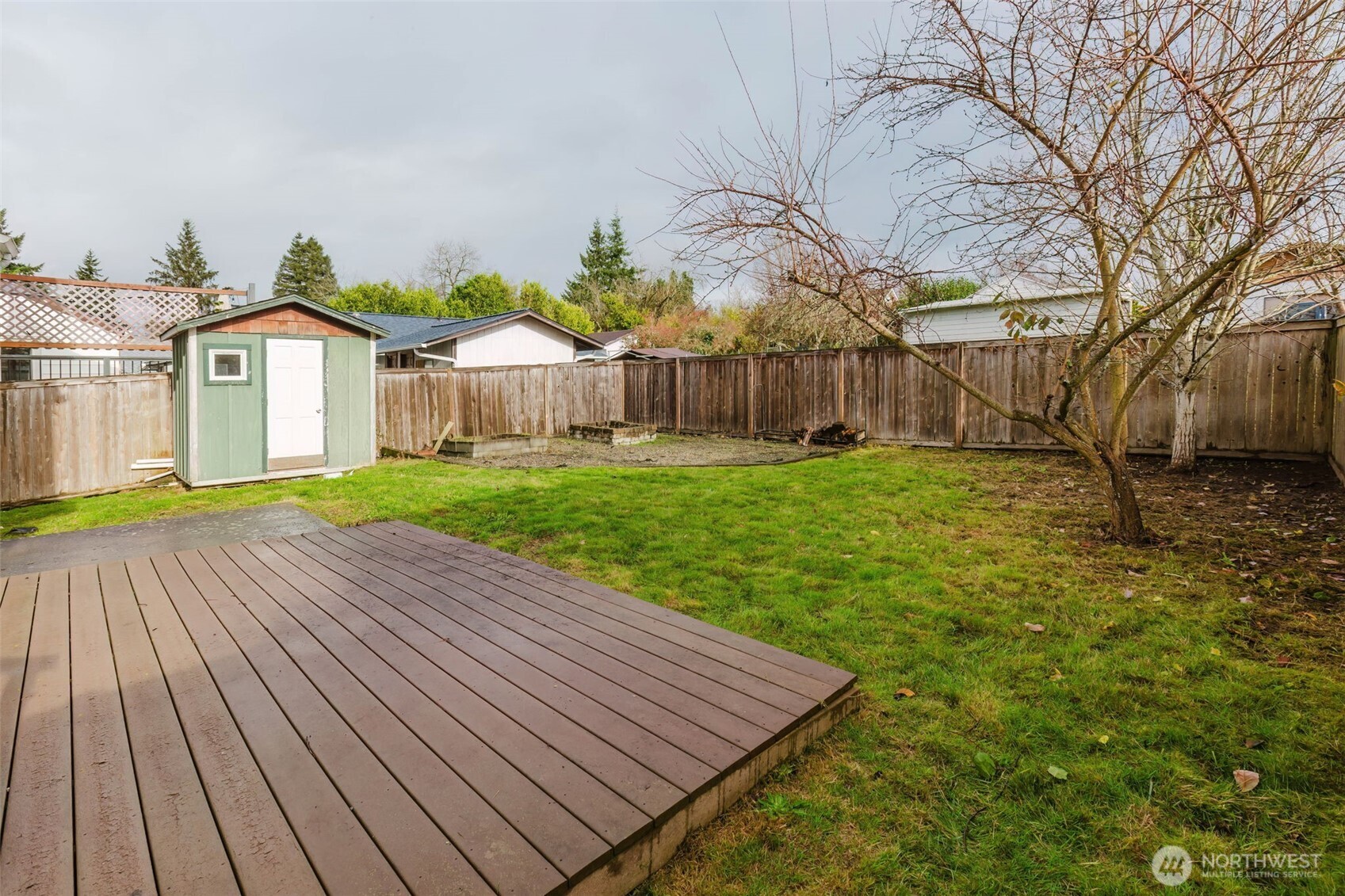 1908 Snyder Avenue Bremerton, WA 98312 - Photo 32 of 35 a view of a backyard with a garden