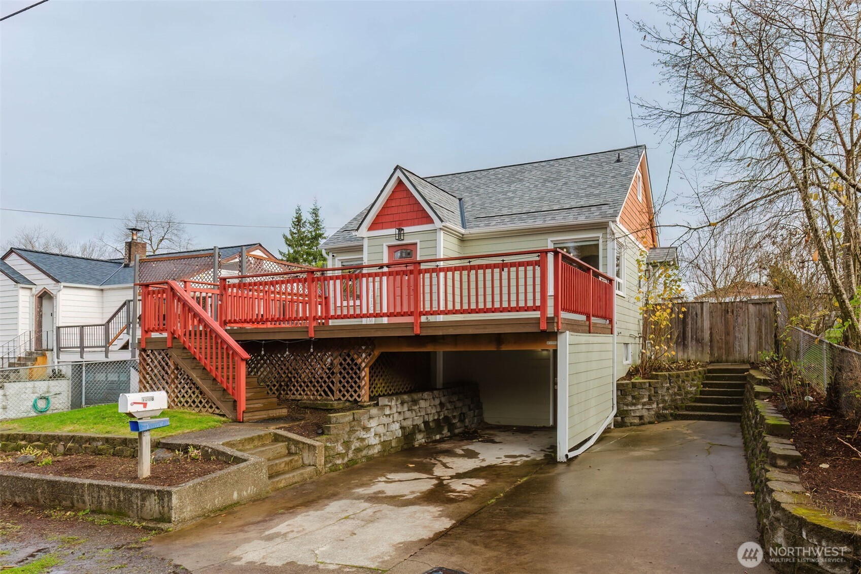 1908 Snyder Avenue Bremerton, WA 98312 - Photo 4 of 35 a view of a house with wooden fence