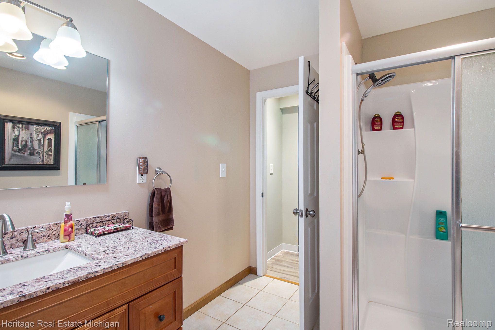 16505 South Seymour Road Linden, MI 48451 - Photo 24 of 33 3rd full bath off the Family Room