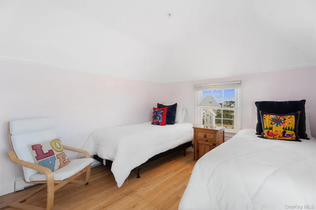 a bathroom with a granite countertop sink mirror and shower