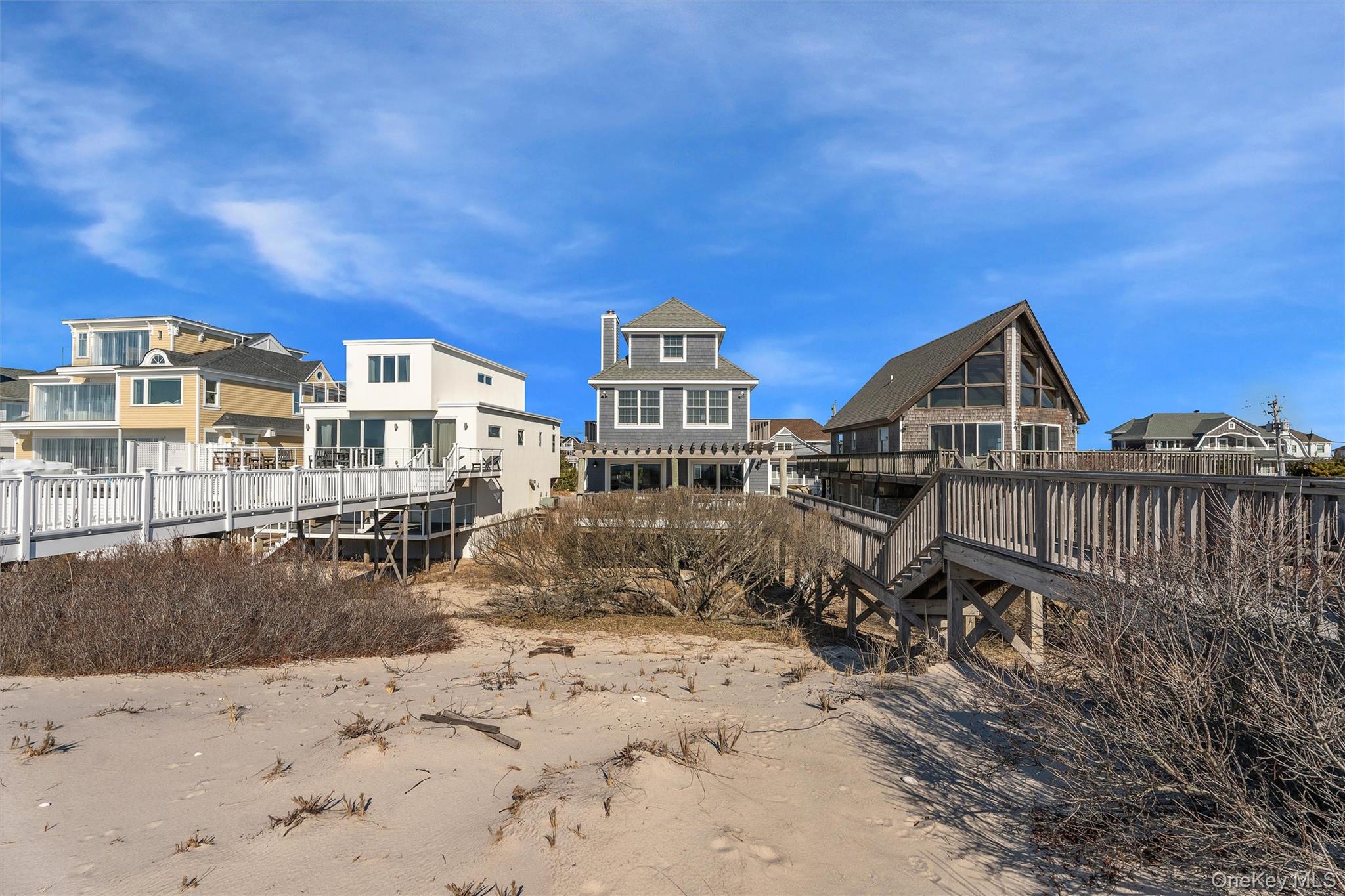 891 Dune Road West Hampton Dunes, NY 11978 - Photo 27 of 34 a view of residential houses with wooden fence