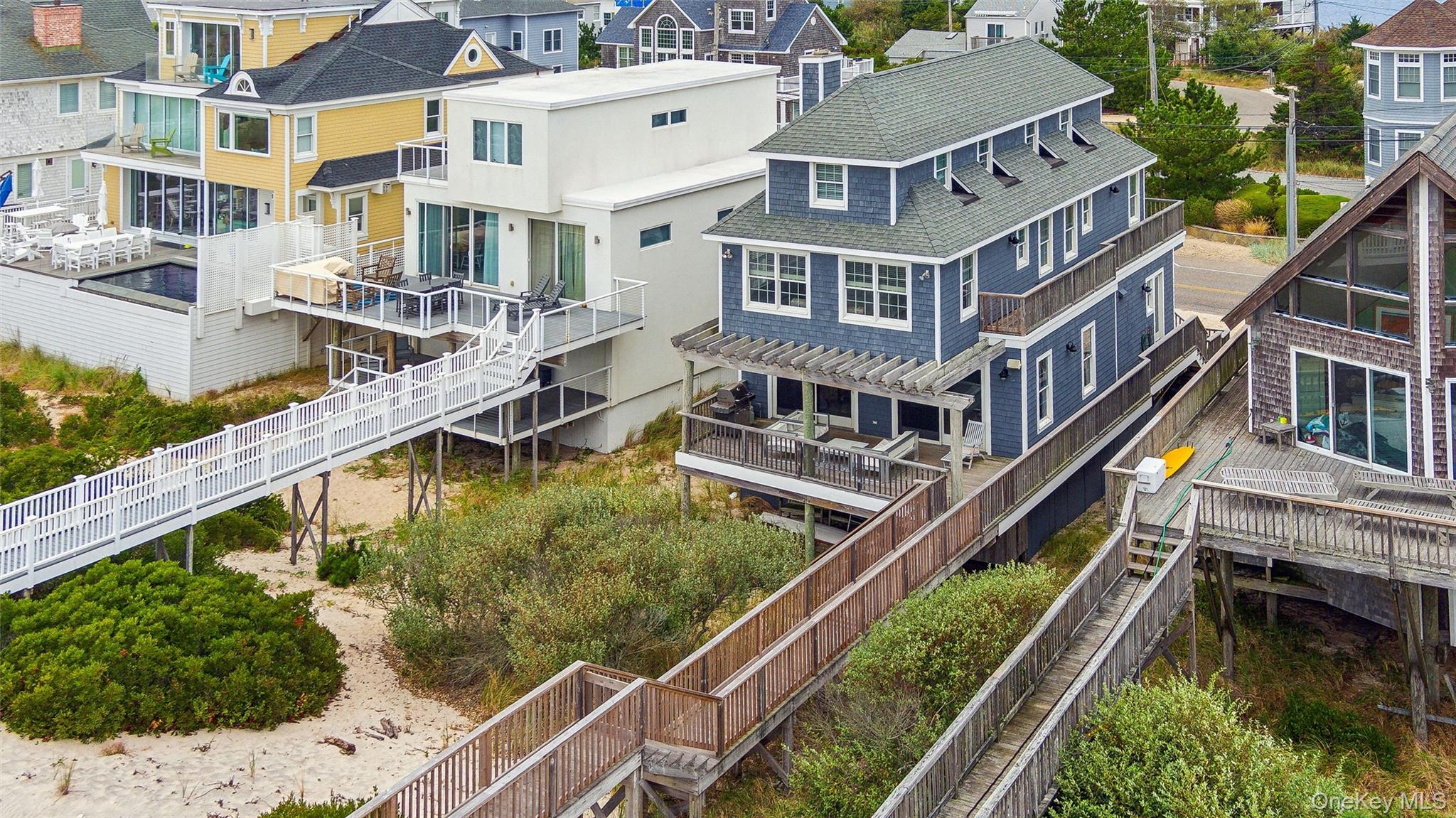 891 Dune Road West Hampton Dunes, NY 11978 - Photo 28 of 34 an aerial view of an house with swimming pool