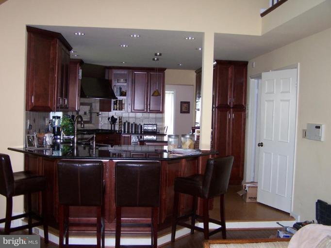 605 Ridgewell Way Silver Spring, MD 20902 - Photo 3 of 6 GRANITE COUNTERS/ BREAKFAST BAR