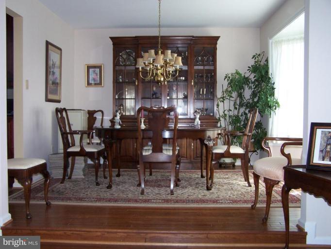 605 Ridgewell Way Silver Spring, MD 20902 - Photo 5 of 6 FORMAL DINNING ROOM WITH HARDWOOD FLOORS