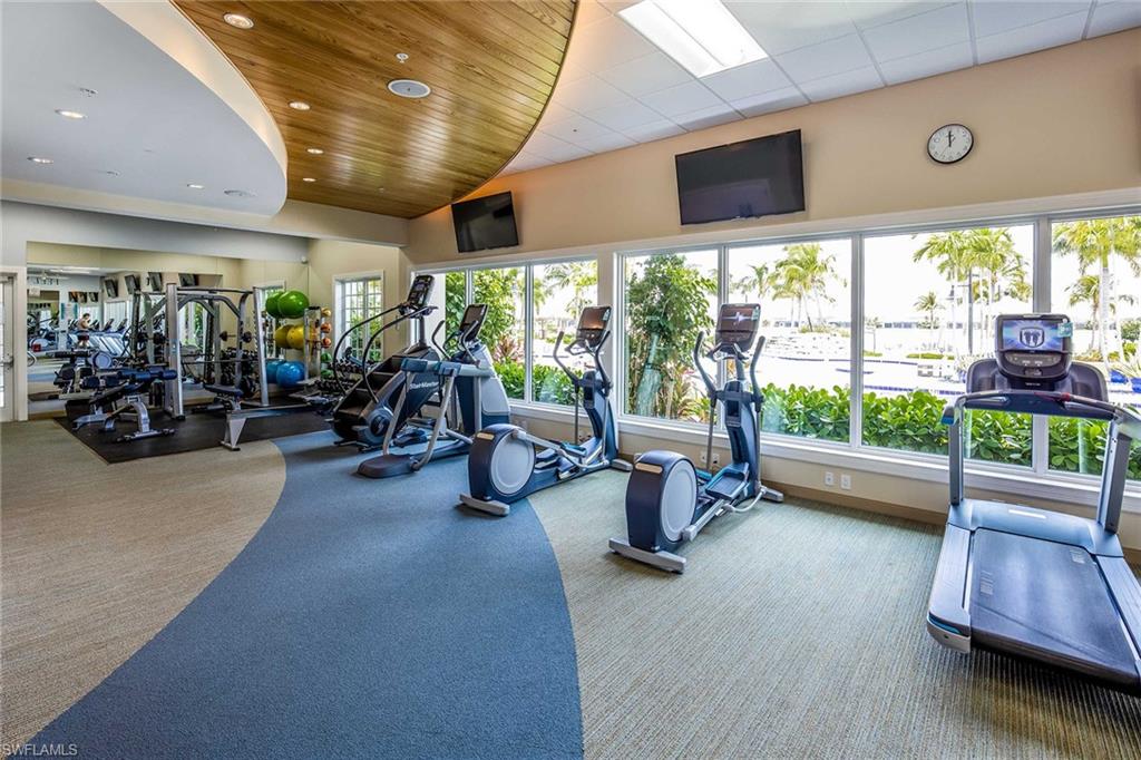 14533 Edgewater Circle Naples, FL 34114 - Photo 22 of 24 a view of a room with gym equipment