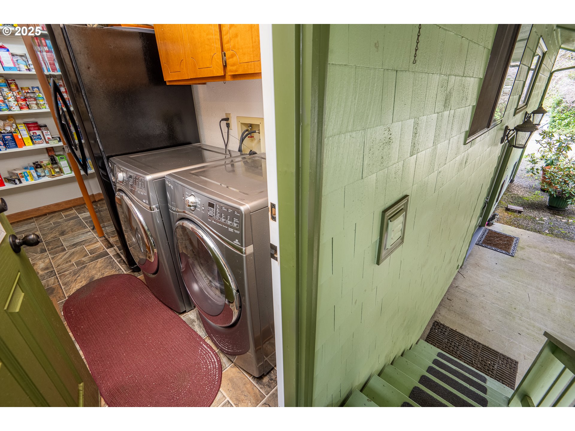 10927 East Mapleton Road Mapleton, OR 97453 - Photo 28 of 47 a utility room with dryer and washer