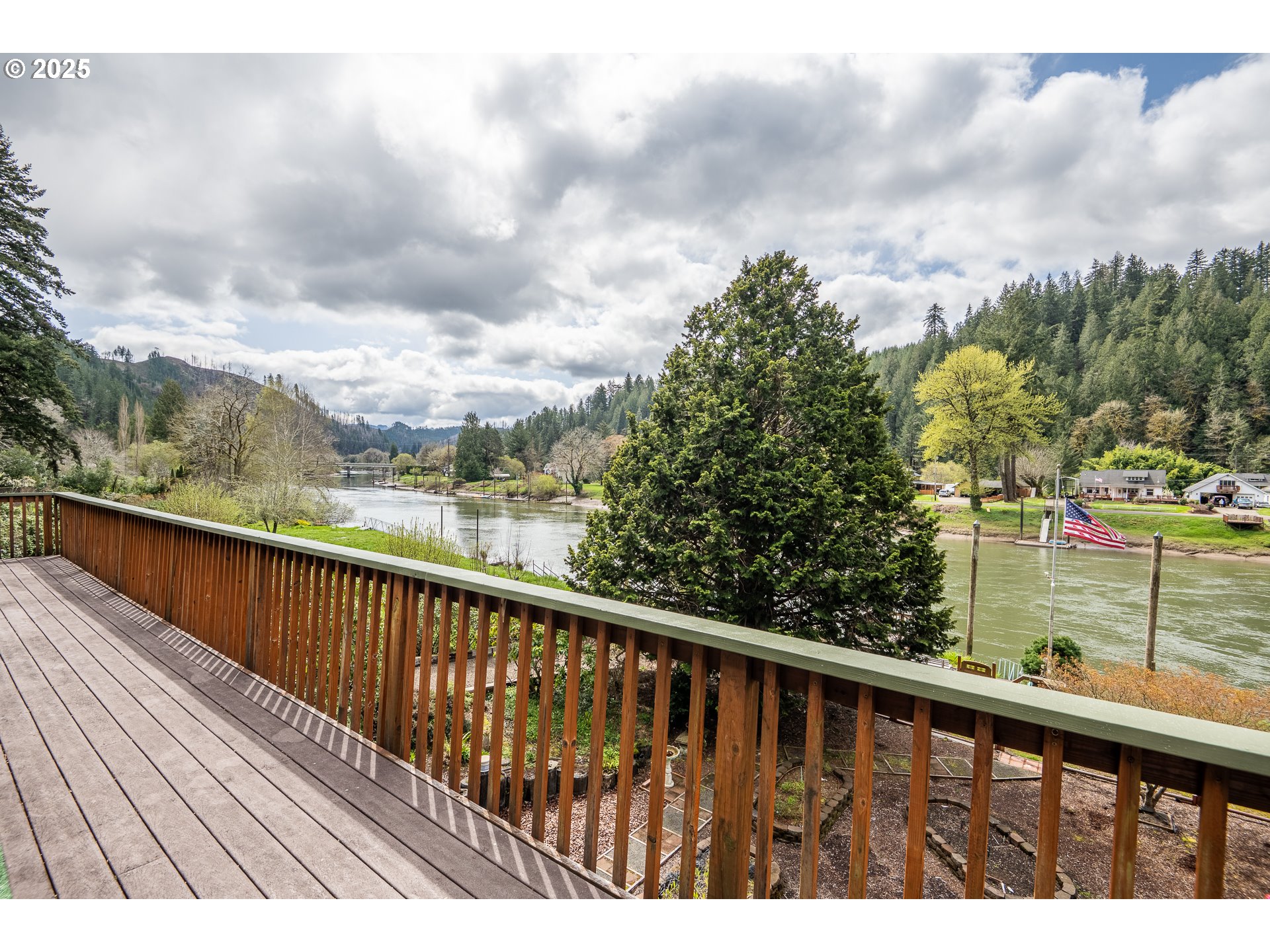 10927 East Mapleton Road Mapleton, OR 97453 - Photo 37 of 47 a balcony with wooden floor