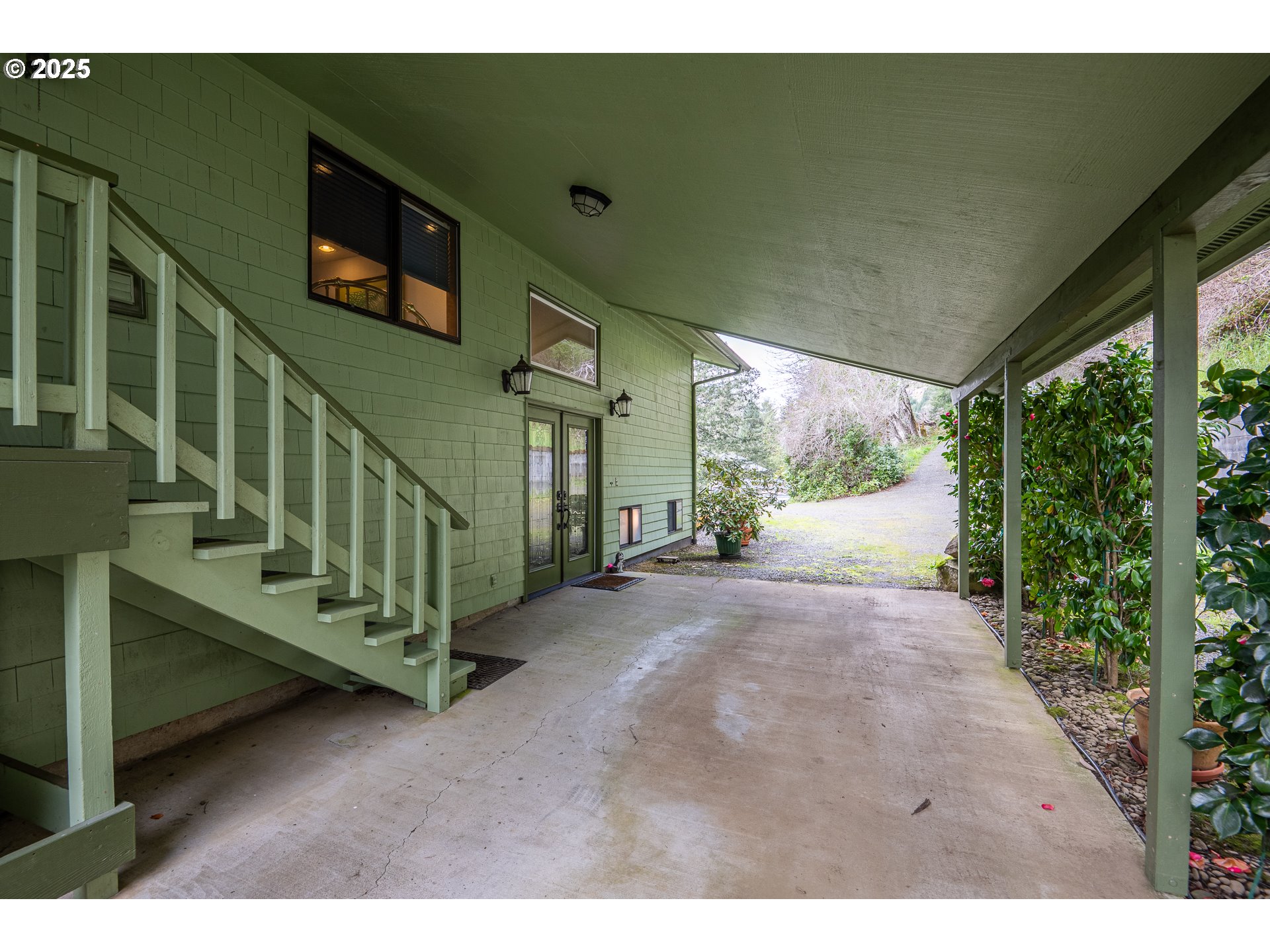 10927 East Mapleton Road Mapleton, OR 97453 - Photo 41 of 47 a view of a porch with furniture and a yard
