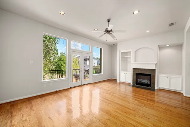 a bathroom with a double vanity sink a mirror and a shower