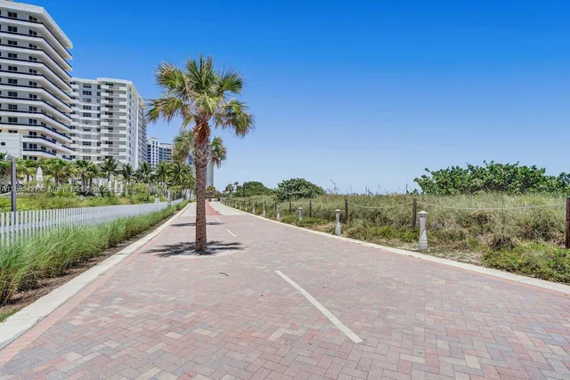 a view of a terrace with a table and chairs