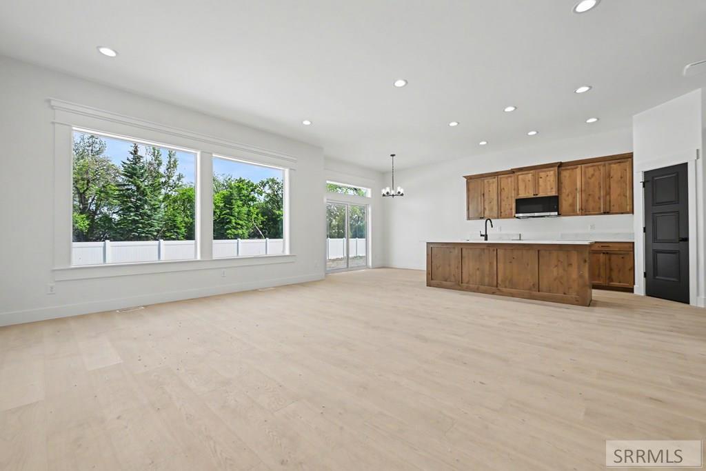 460 Willowbend Rigby, ID 83442 - Photo 2 of 17 Great Room to Kitchen/Dining Area