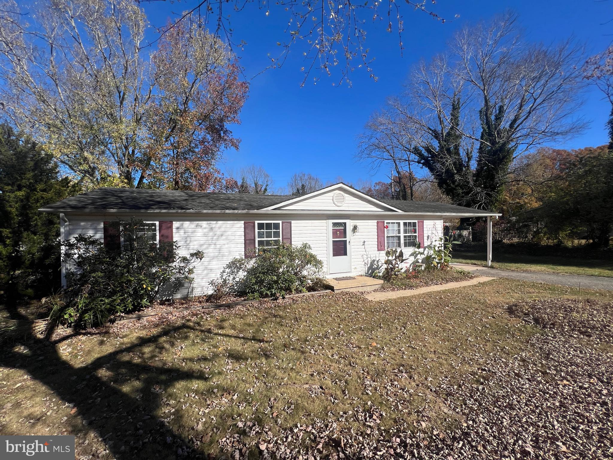 17 Robshire Manor Road Huntingtown, MD 20639 - Photo 1 of 3 a front view of a house with yard