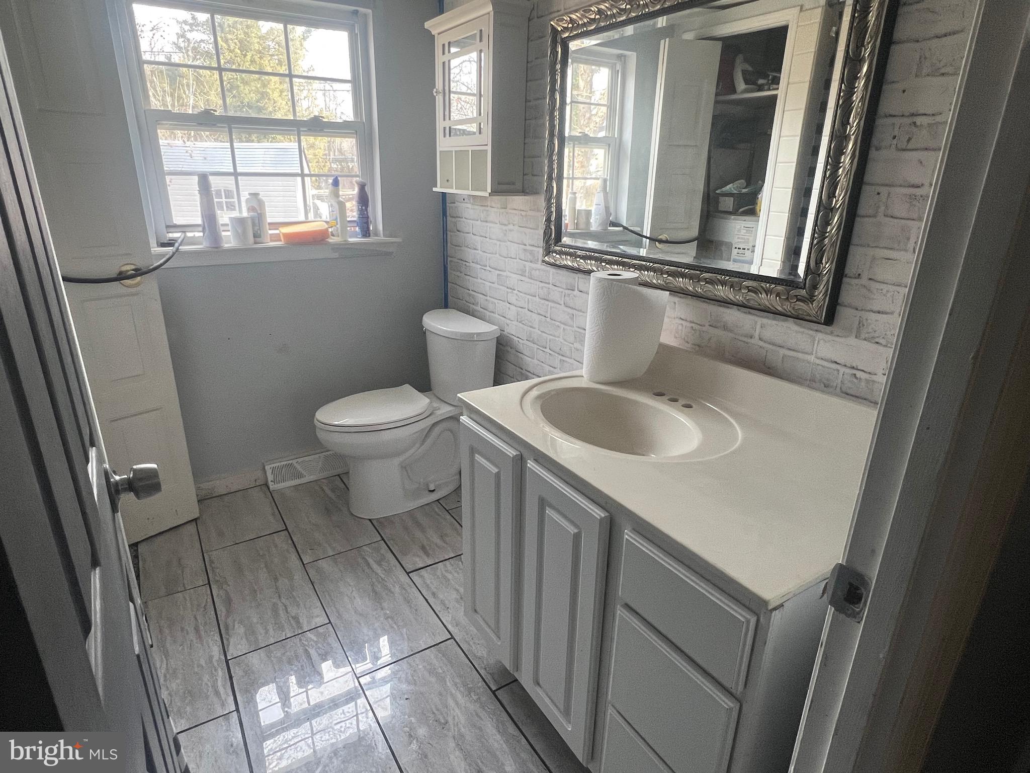 17 Robshire Manor Road Huntingtown, MD 20639 - Photo 2 of 3 a bathroom with a sink and a toilet