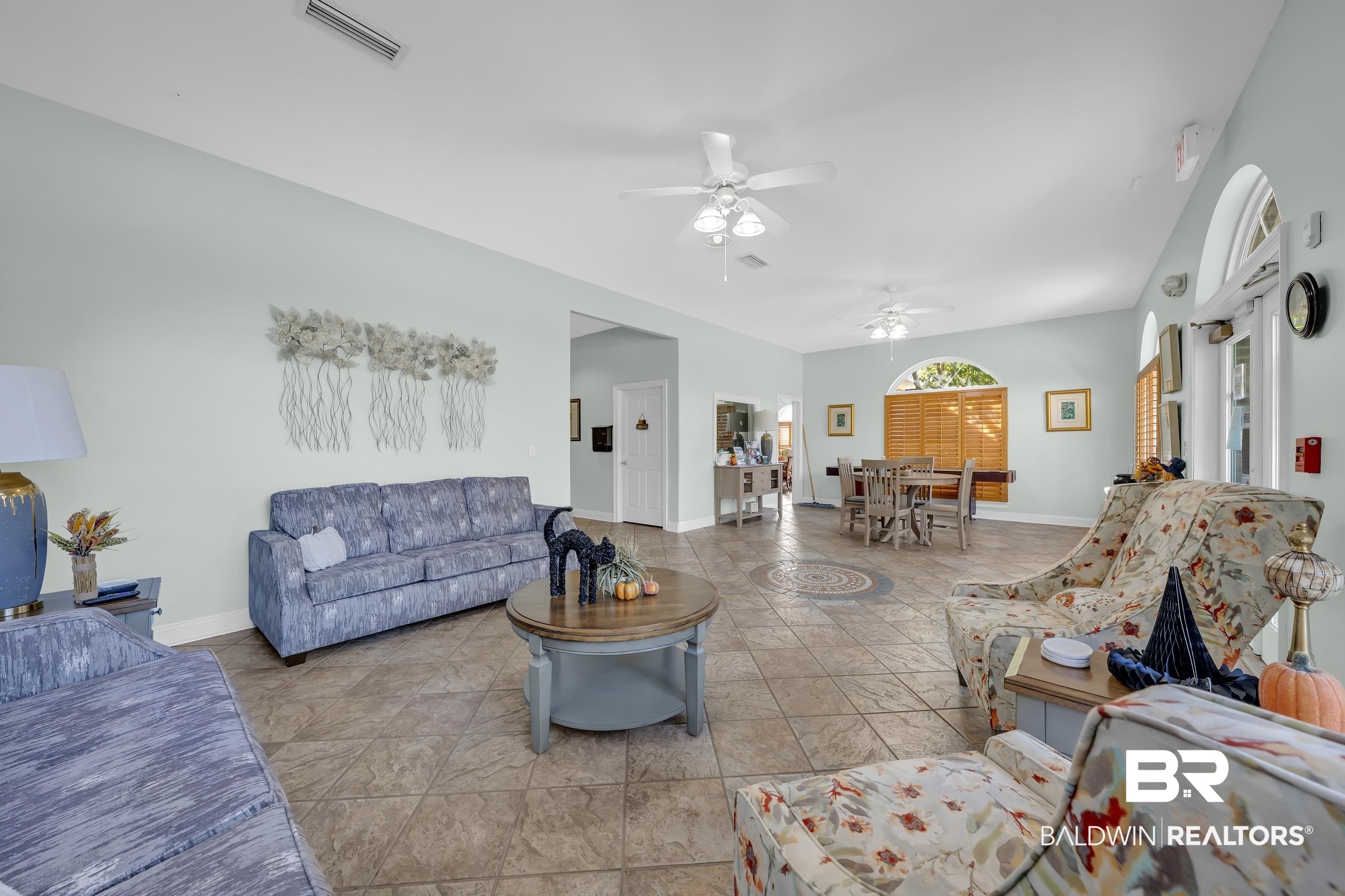 226 Hemingway Loop Foley, AL 36535 - Photo 27 of 53 Living area with a ceiling fan and tile patterned flooring