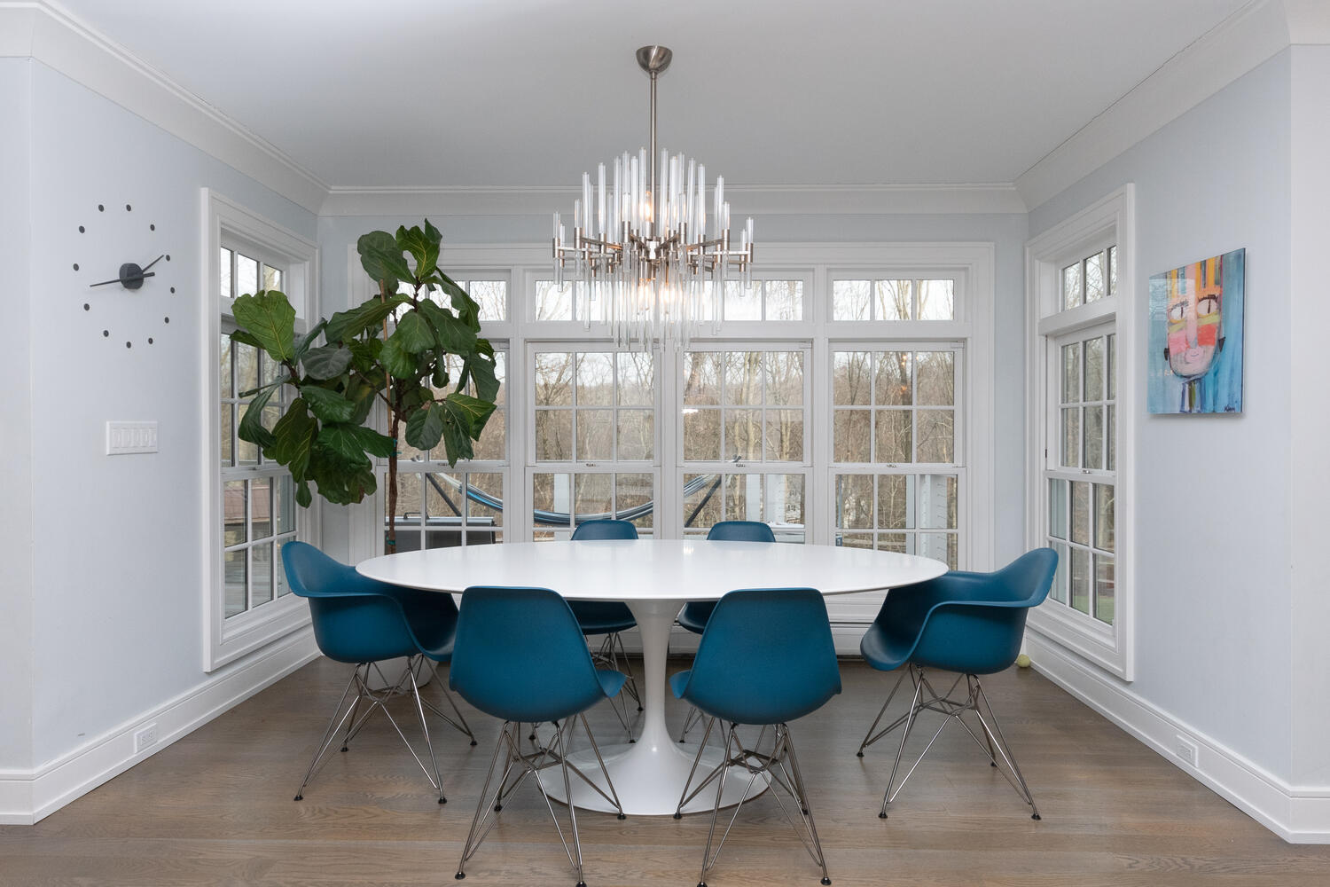 232 Jonathan Road New Canaan, CT 06840 - Photo 14 of 30 a view of a dining room with furniture a chandelier and wooden floor