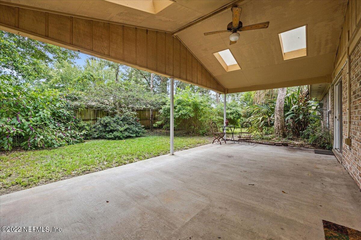 5504 Weaver Road Orange Park, FL 32073 - Photo 14 of 15 a view of a house with backyard and porch
