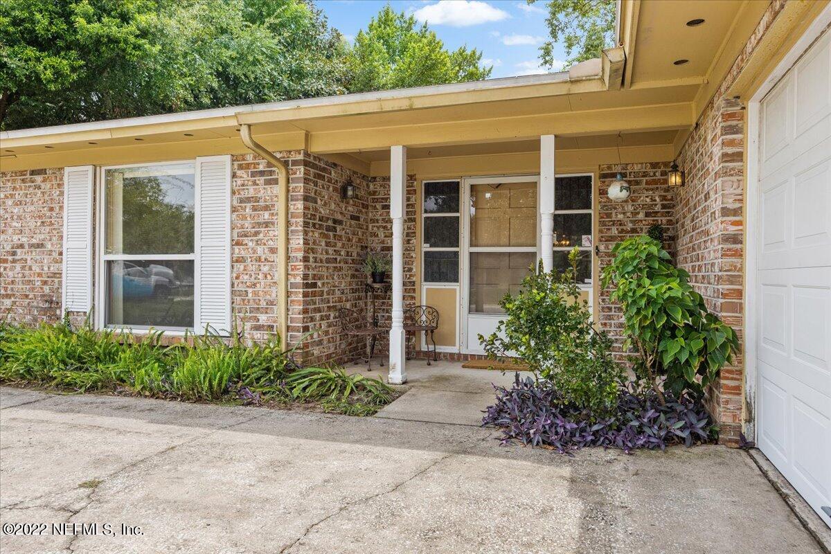 5504 Weaver Road Orange Park, FL 32073 - Photo 2 of 15 a view of a house with potted plants
