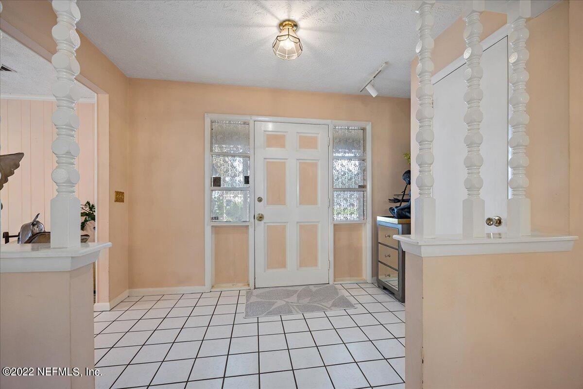 5504 Weaver Road Orange Park, FL 32073 - Photo 6 of 15 a bathroom with a sink a toilet and shower