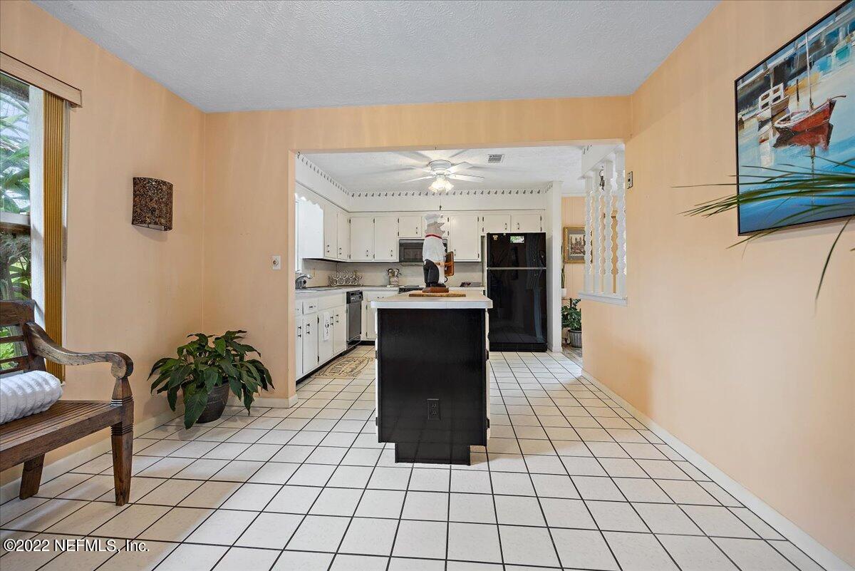 5504 Weaver Road Orange Park, FL 32073 - Photo 8 of 15 a kitchen with stainless steel appliances granite countertop a refrigerator and a sink