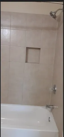 a bathroom with a bathtub