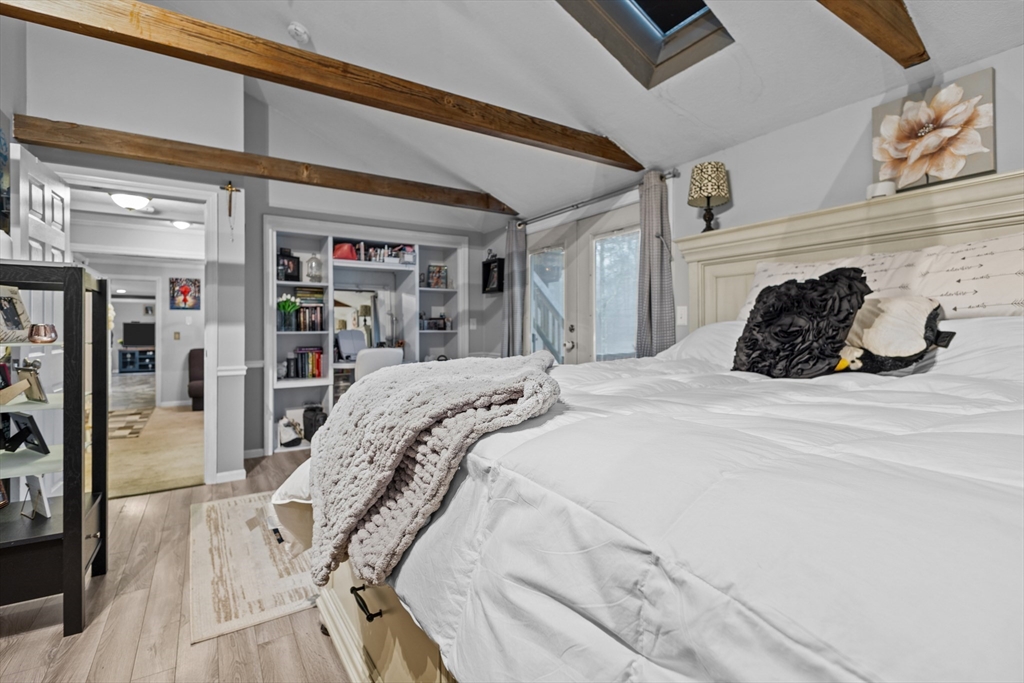 14 Mine Brook Road Rehoboth, MA 02769 - Photo 15 of 40 a bedroom with a large bed and a large mirror