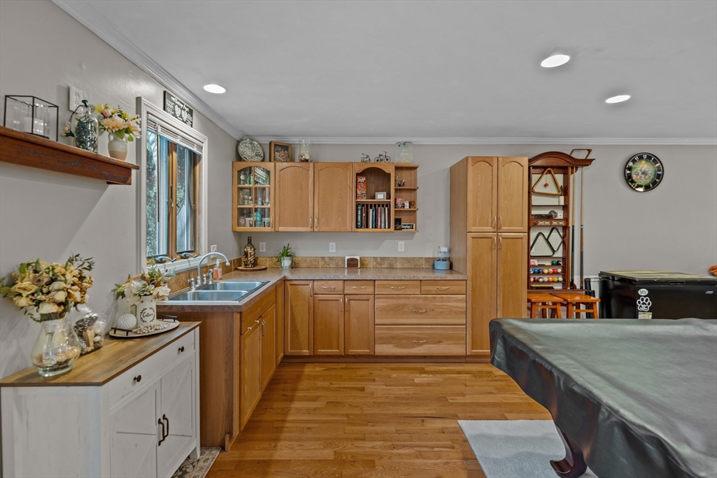 14 Mine Brook Road Rehoboth, MA 02769 - Photo 21 of 40 a kitchen with stainless steel appliances granite countertop a sink stove and cabinets