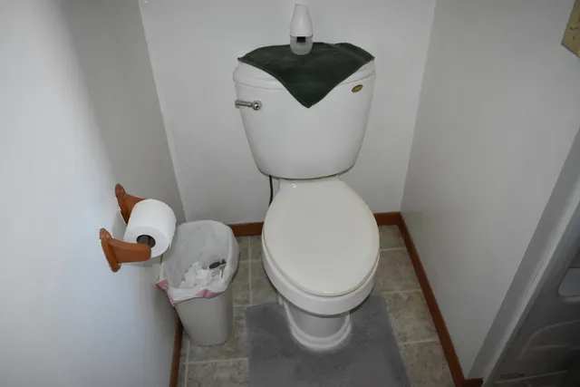 a close view of a toilet in a bathroom