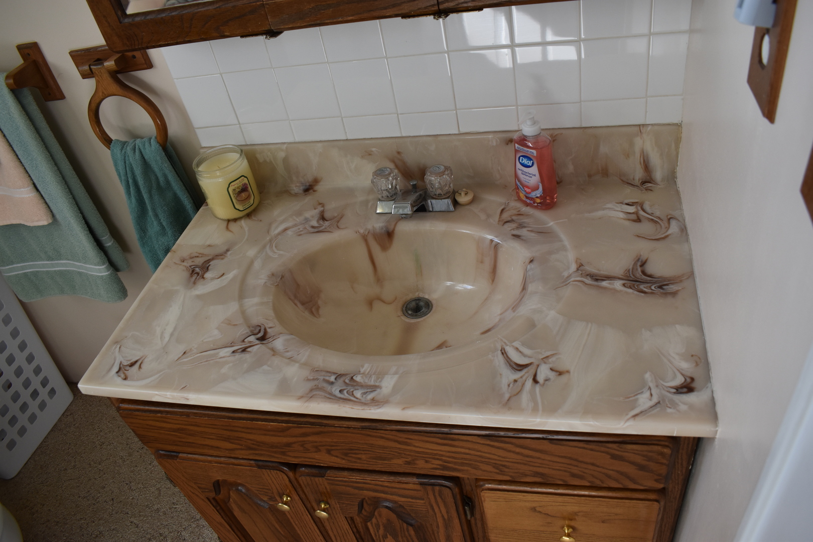 9898 East 1200 N Road Chenoa, IL 61726 - Photo 19 of 50 a bathroom with a sink and a mirror