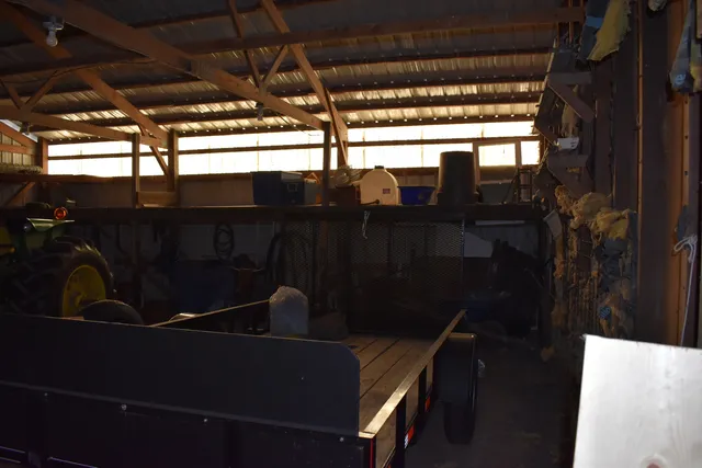 a view of balcony with furniture