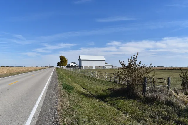 a view of a lake with a yard