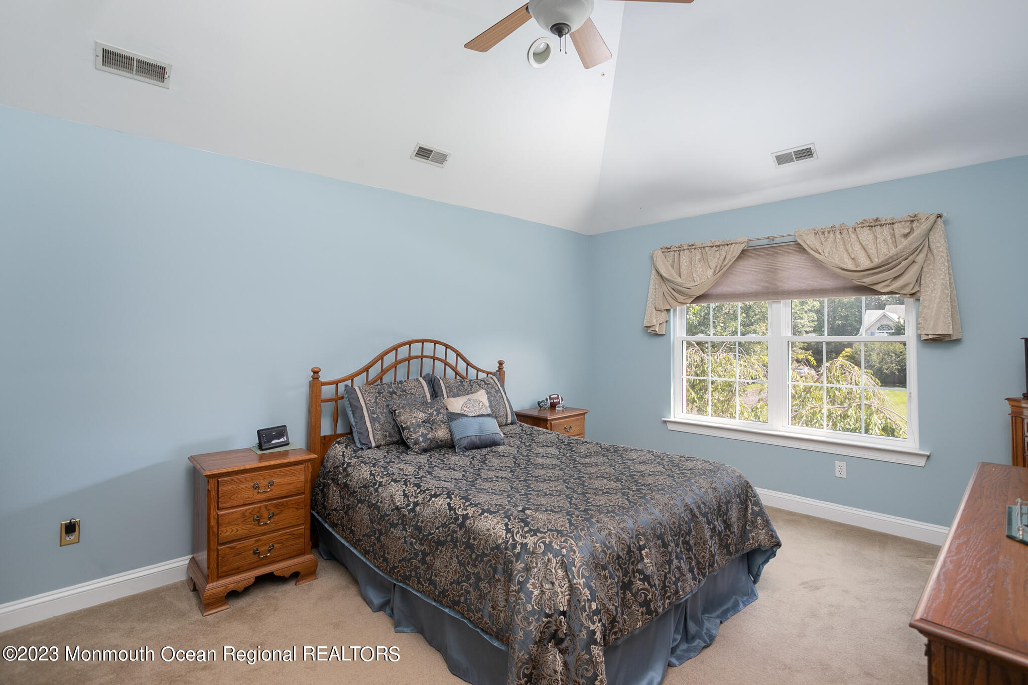 68 Erin Drive Jackson, NJ 08527 - Photo 24 of 40 a bed sitting in a bedroom next to a window