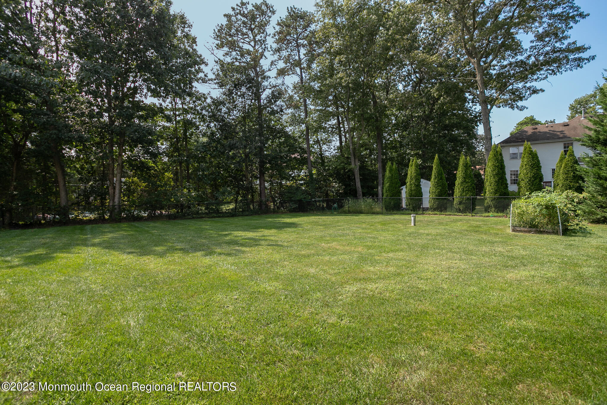 68 Erin Drive Jackson, NJ 08527 - Photo 33 of 40 a view of outdoor space with deck and yard