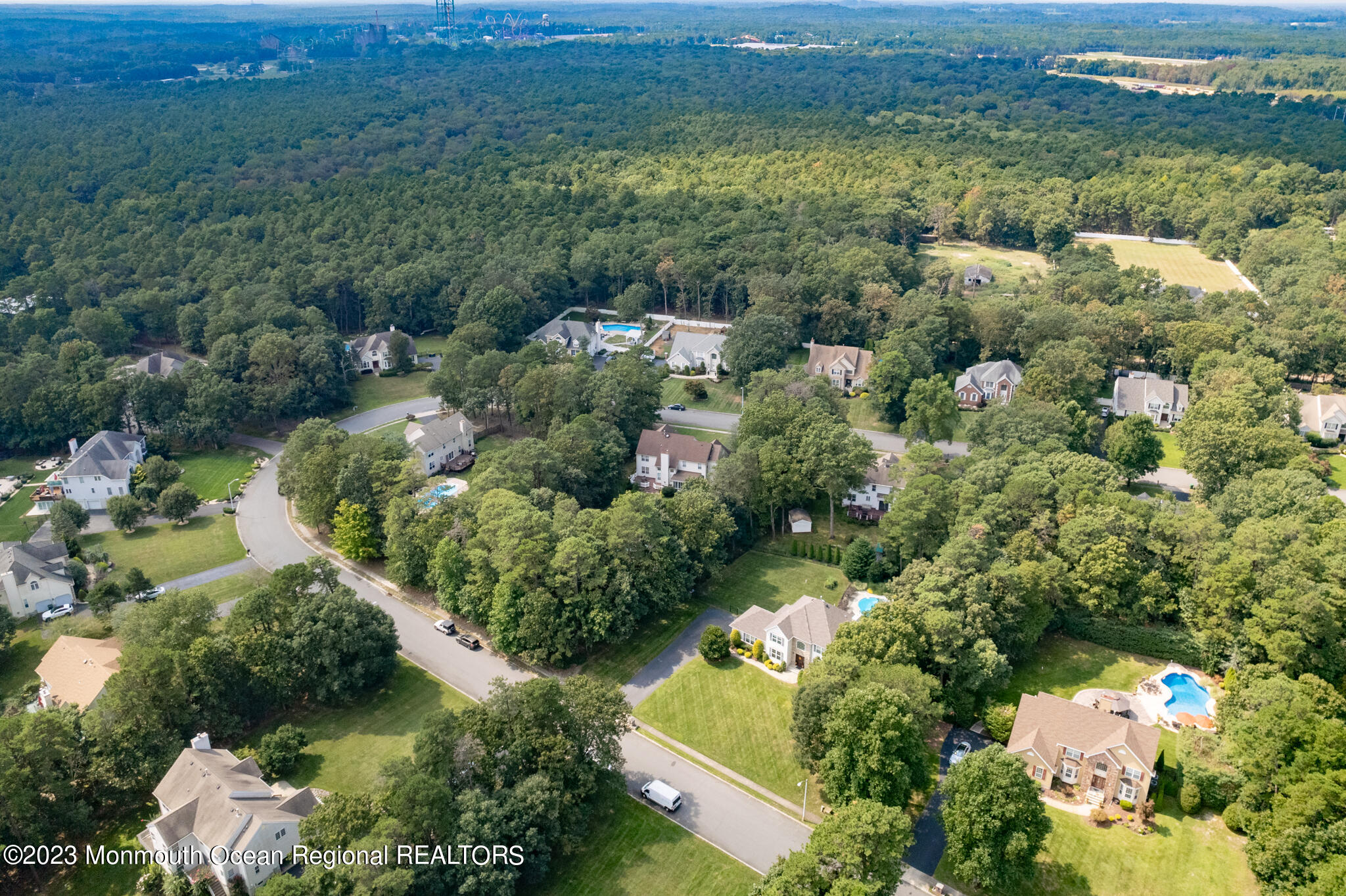 68 Erin Drive Jackson, NJ 08527 - Photo 39 of 40 an aerial view of residential house with outdoor space and trees all around