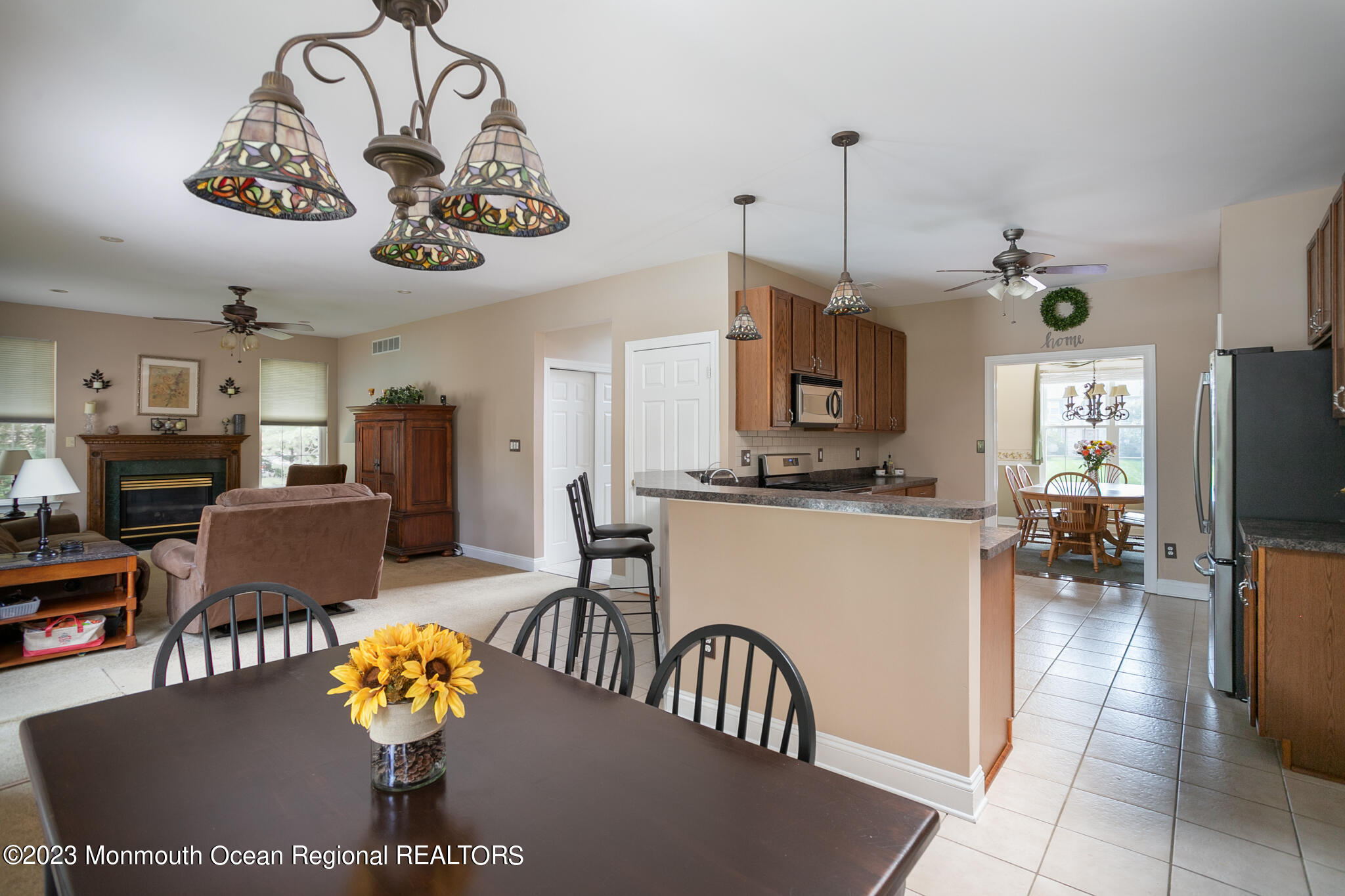 68 Erin Drive Jackson, NJ 08527 - Photo 10 of 40 a view of a dining room with furniture