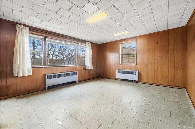 an empty room with windows