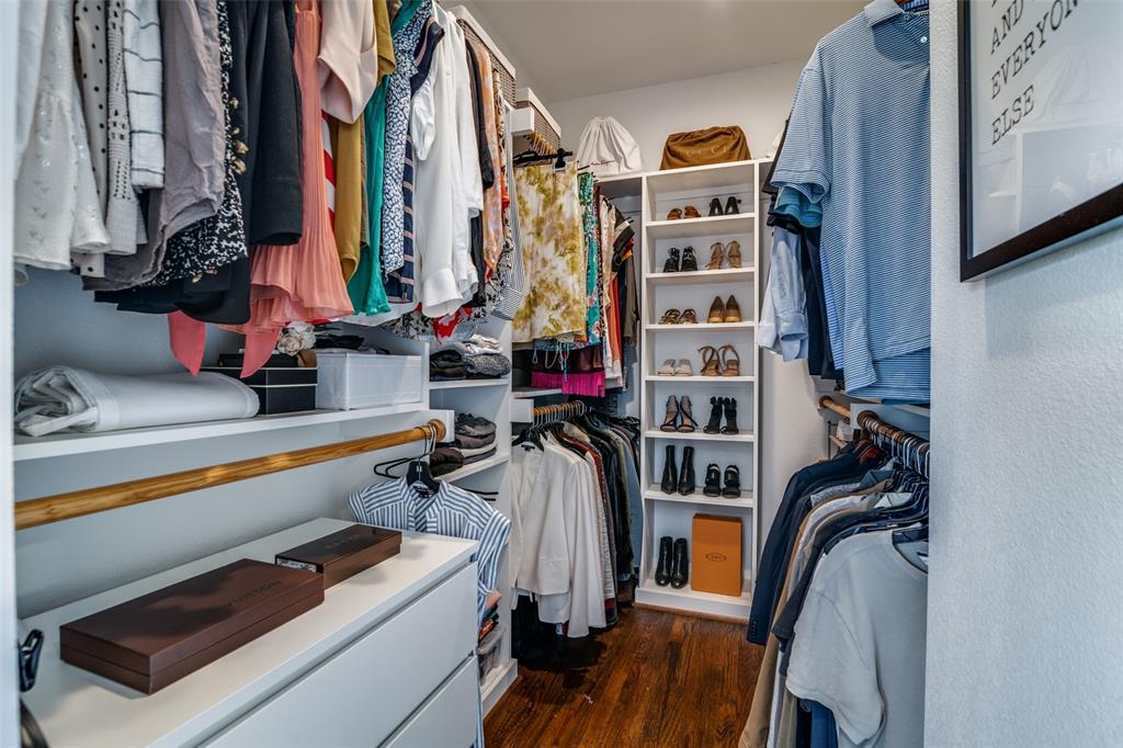 5602 Lindell Avenue, Unit B Dallas, TX 75206 - Photo 17 of 29 a view of walk in closet with clothes and shoes