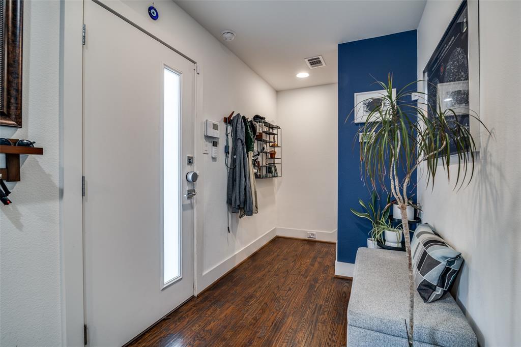 5602 Lindell Avenue, Unit B Dallas, TX 75206 - Photo 5 of 29 a view of a hallway with wooden floor and entryway