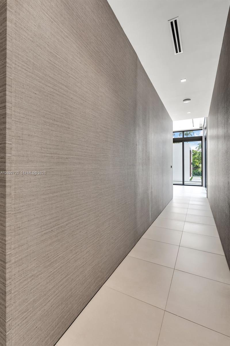 7825 Southwest 128th Street Pinecrest, FL 33156 - Photo 21 of 88 a view of hallway with a window