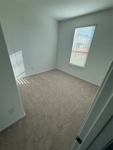 a view of a house with a yard and a tub