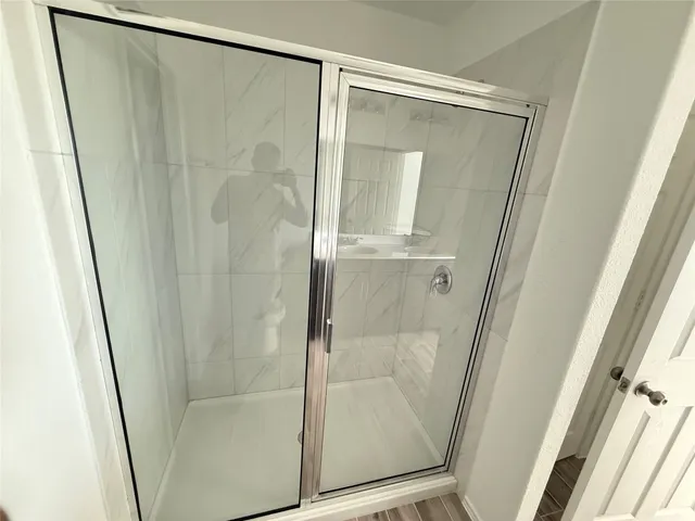 a view of a refrigerator in a room