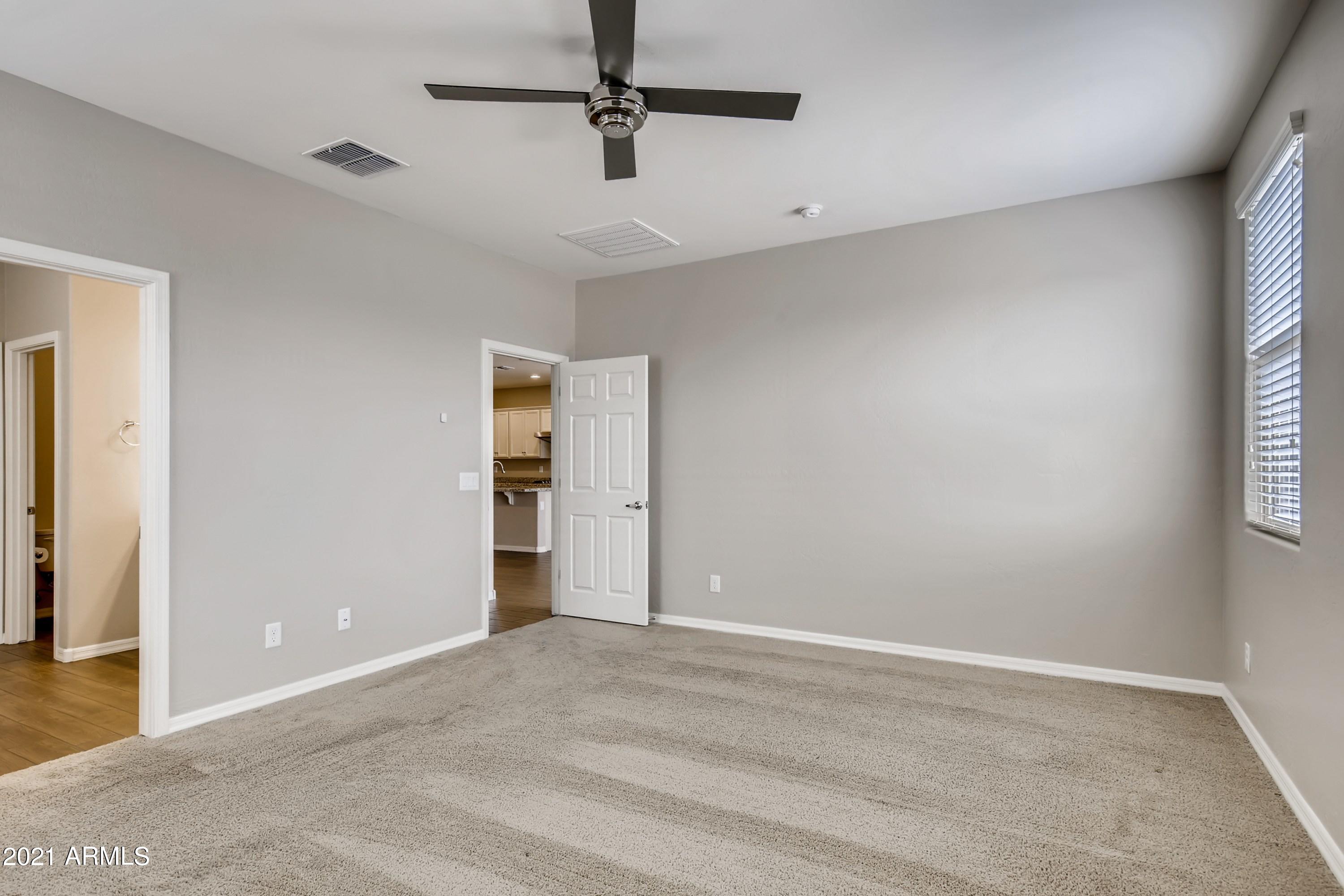 17735 West Sandy Road Goodyear, AZ 85338 - Photo 10 of 25 26 Primary Bedroom